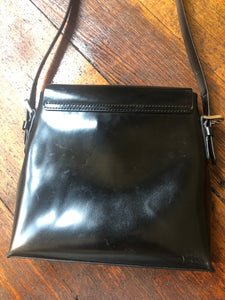 1990's | Moschino | Black Patent Leather Bag With Silver Heart Closure