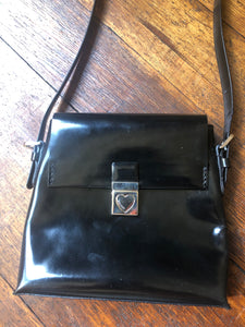 1990's | Moschino | Black Patent Leather Bag With Silver Heart Closure